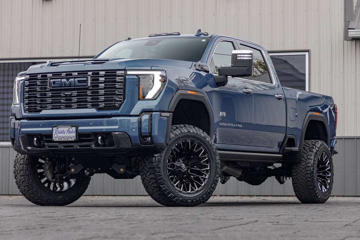 2024 GMC Sierra 2500 Denali Ultimate with a 5" BDS lift kit, Fuel Strike wheels, and 37" Nitto Ridge Grappler tires.
