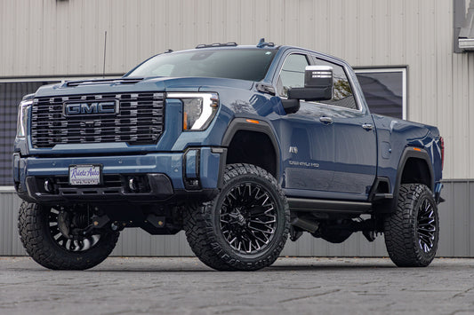 2024 GMC Sierra 2500 Denali Ultimate with a 5" BDS lift kit, Fuel Strike wheels, and 37" Nitto Ridge Grappler tires.