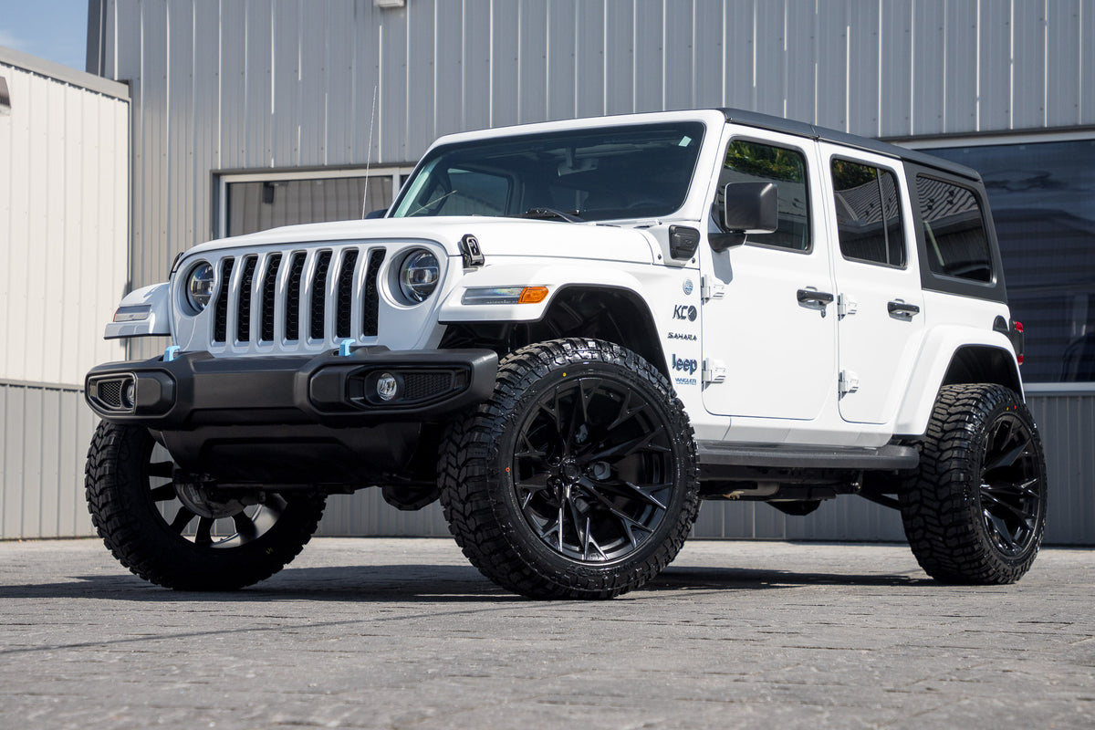 2022 Jeep Wrangler Unlimited Sahara 4XE with a 2.5" Rough Country lift kit, 22x12 Fuel Flame wheels, and 35" Avix Trailtek R/T tires.