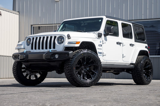 2022 Jeep Wrangler Unlimited Sahara 4XE with a 2.5" Rough Country lift kit, 22x12 Fuel Flame wheels, and 35" Avix Trailtek R/T tires.