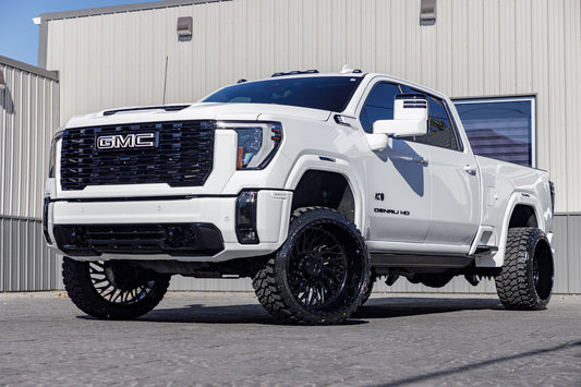 2024 GMC Sierra 3500 Denali Ultimate with a 3" Cognito Leveling kit, 24x14 American Force Swang wheels, and 33" Fury Country Hunter M/T tires.