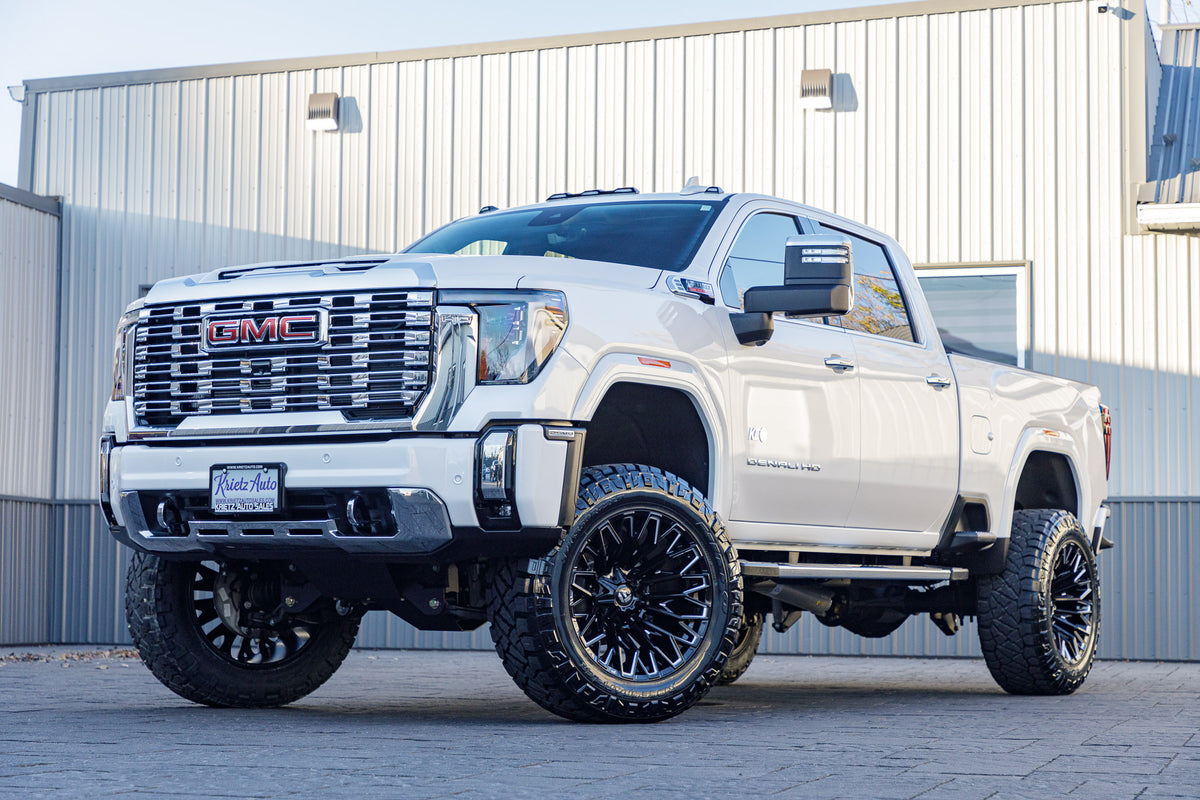 2024 GMC Sierra 2500 Denali with a 5" BDS lift kit, 22x12 Fuel Strike wheels, and 37" Nitto Ridge Grappler tires.