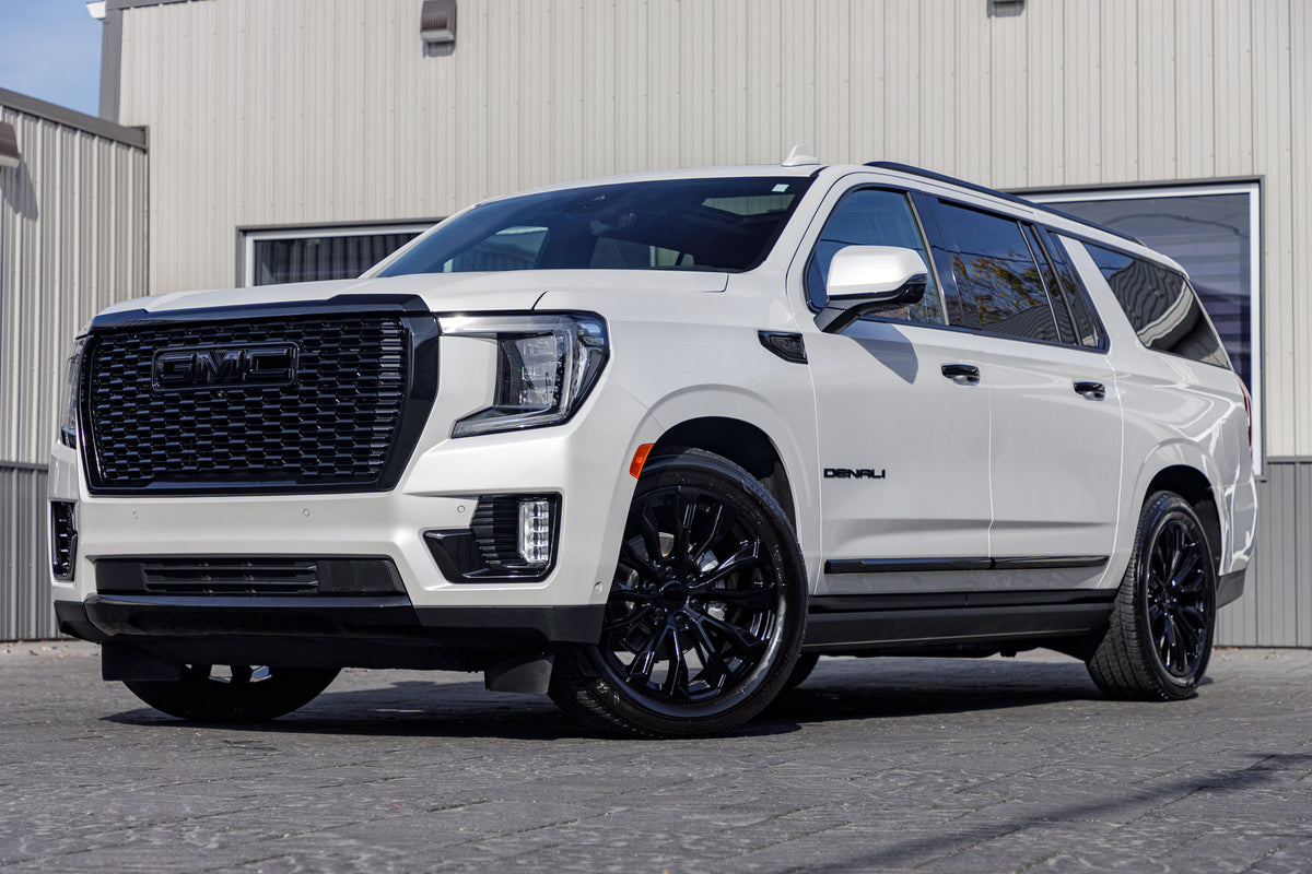 2023 GMC Yukon with GMC Factory suspension, 22x9 GMC Stock wheels, and Bridgestone Alenza tires.