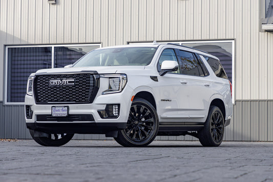 2023 GMC Yukon Denali with GMC Factory suspension, 22x9 GMC Stock wheels, and Bridgestone Alenza tires.