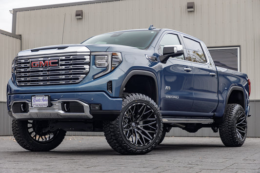 2024 GMC Sierra 1500 Denali with a 6" Rough Country lift kit, 22x12 TIS 566BM wheels, and 35" Fury Country Hunter R/T tires.