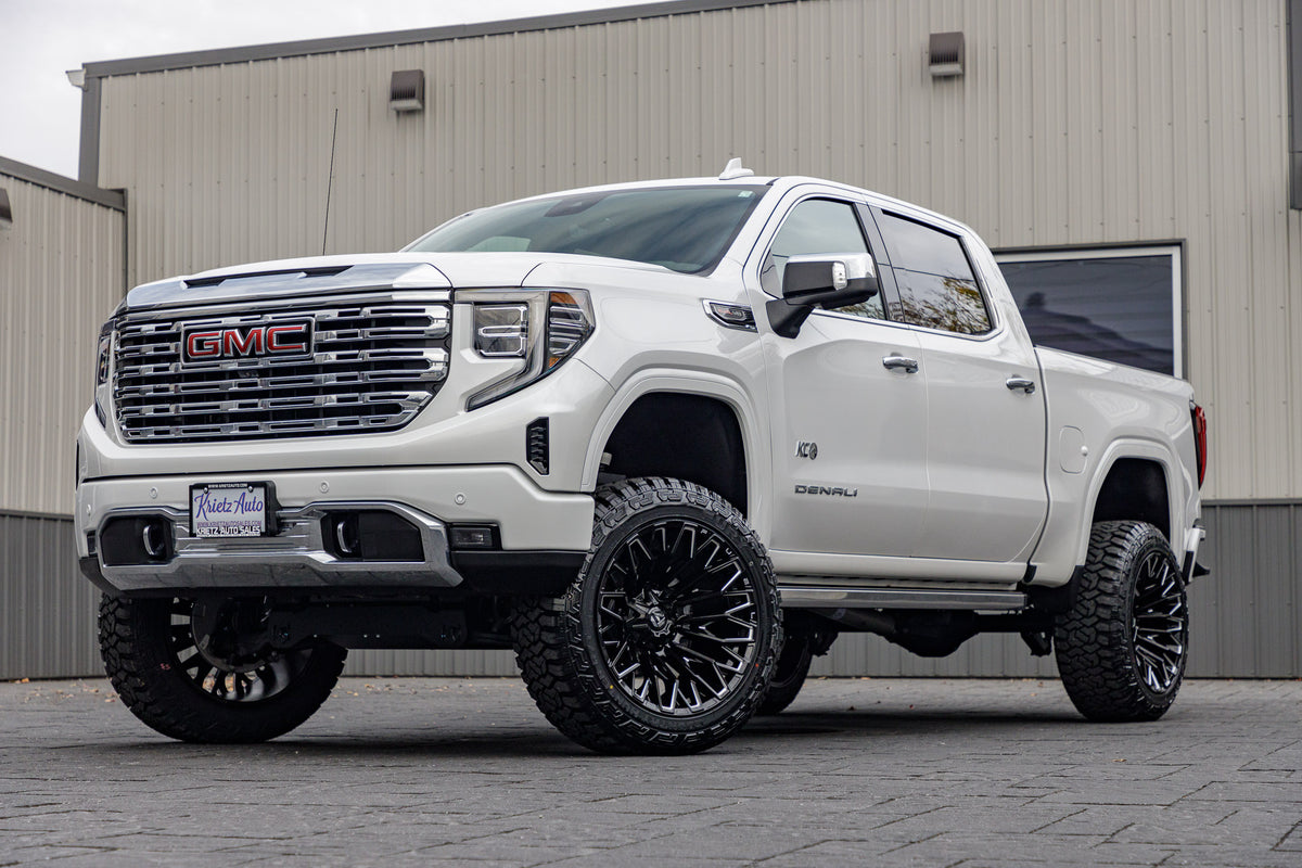 2023 GMC Sierra 1500 Denali with a 6" Rough Country suspension kit, 22x12 Fuel Strike wheels, and 35" Fury Country Hunter R/T tires.