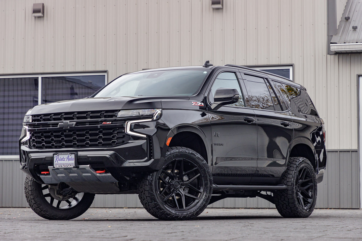 2023 Chevrolet Tahoe Z71 with a 3" ReadyLift lift kit, 22x10 Fuel Flux wheels, and 295/50 Toyo Open Country Hunter AT3 tires.