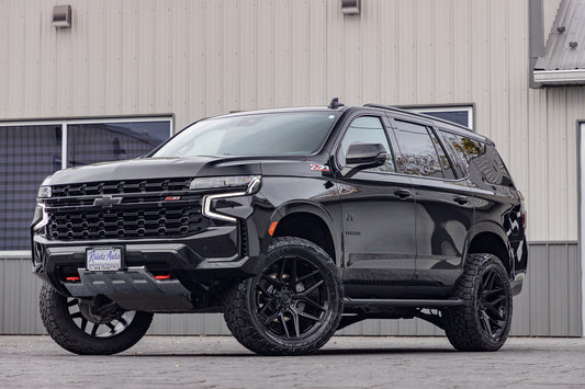 2023 Chevrolet Tahoe Z71 with a 3" ReadyLift lift kit, 22x10 Fuel Flux wheels, and 295/50 Toyo Open Country Hunter AT3 tires.