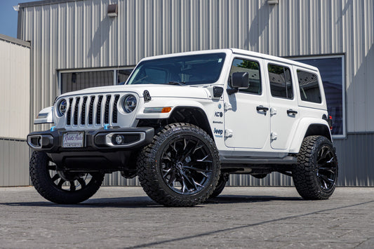 2022 Jeep Wrangler Unlimited Sahara 4XE with a 2.5" Rough Country lift kit, 22x12 Fuel Flame wheels, and 35" Fury Country Hunter R/T tires.