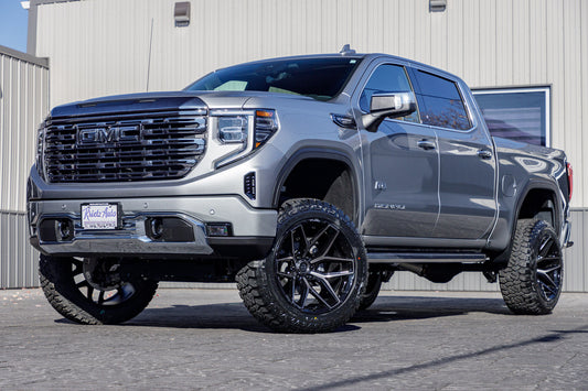2024 GMC Sierra 1500 Denali Ultimate with a 6" Rough Country suspension kit, 22x12 Fuel Flux wheels, and 35" Fury Country Hunter R/T tires.