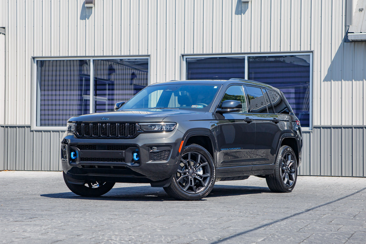 2024 Jeep Grand Cherokee 4XE with Jeep Factory suspension, 20x8.5 Jeep Stock wheels, and 265/50 Bridgestone Dueler H/L 400 tires.