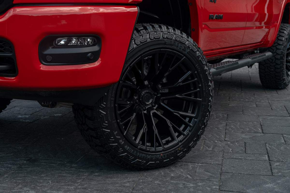 2025 RAM 1500 with Fuel Rebar - Krietz Customs gallery image 03 - Stock # SN601781