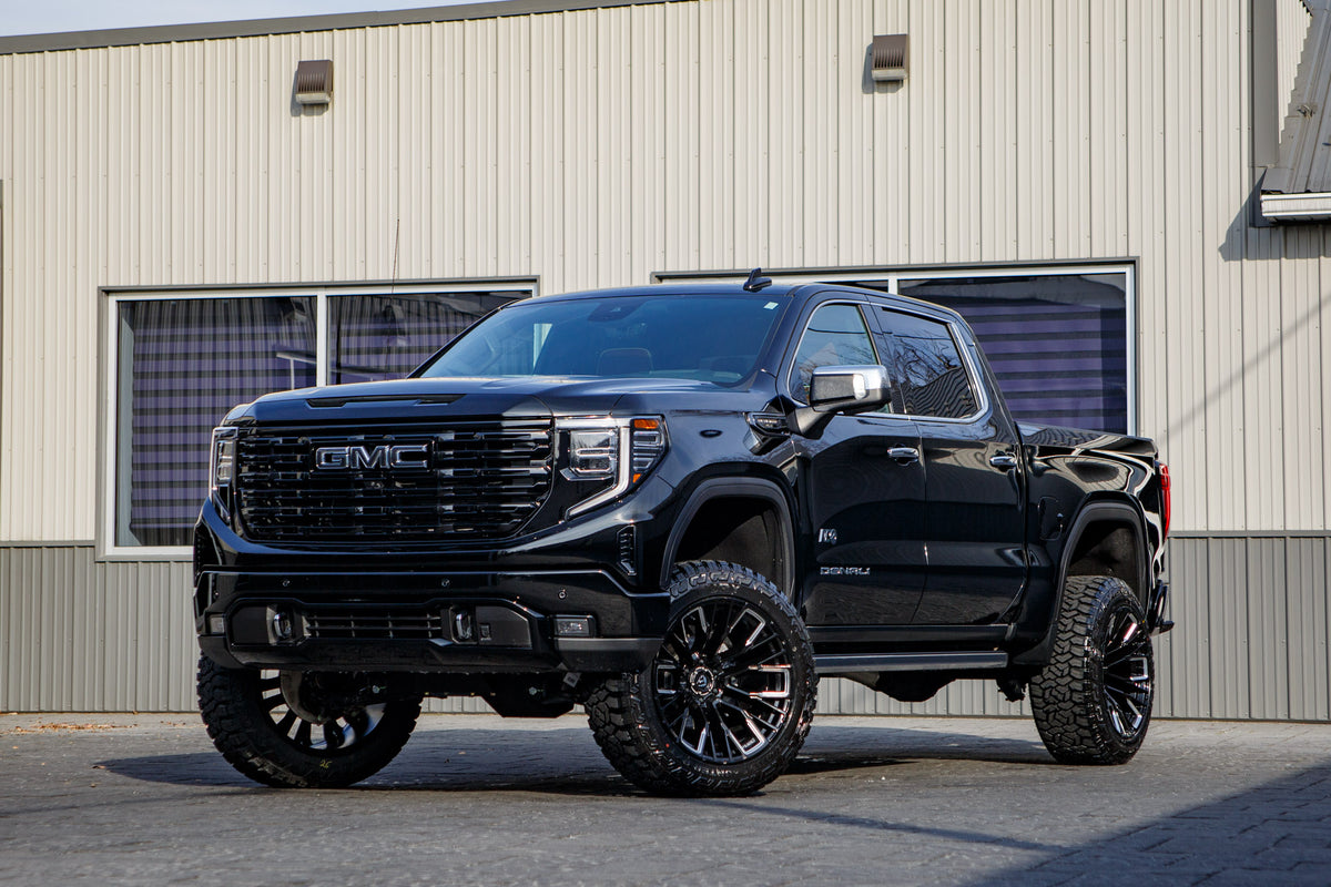 2024 GMC Sierra 1500 Denali Ultimate with a 6" BDS lift kit, 22x12 Fuel Rebar wheels, and 35" Fury Country Hunter R/T tires.