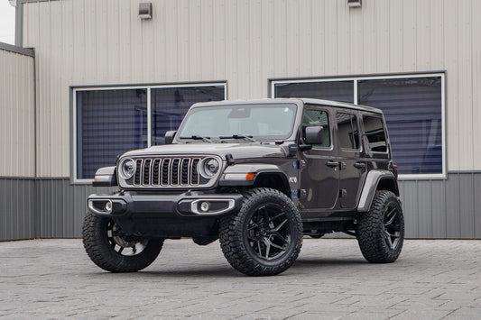 2025 Jeep Wrangler Sahara 4XE with a 2.5" Rough Country lift kit, 20x10 Fuel Flux wheels, and 35" Fury Country Hunter R/T tires.