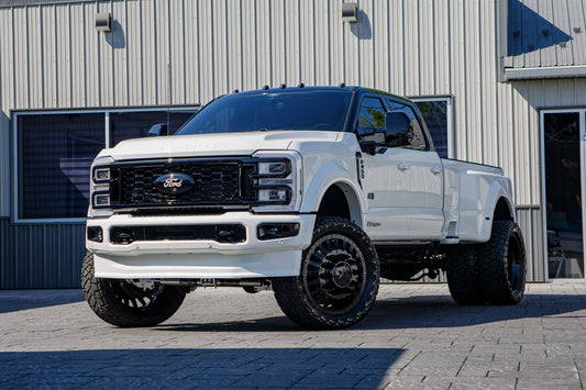2026 Ford F-450 Platinum with a 4" Wicked lift kit, 24x8.25 American Force Doom wheels, and 37" Toyo Open Country R/T Trail tires.