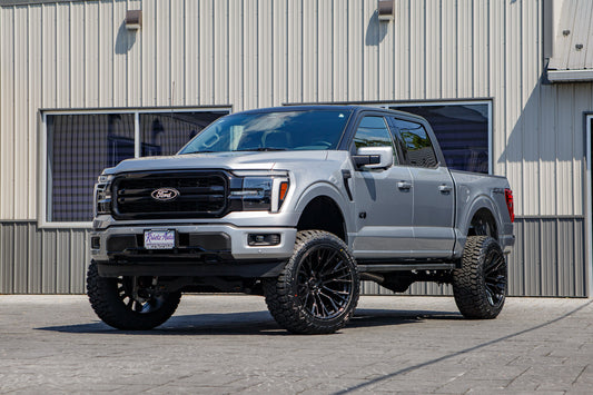 2025 Ford F-150 Lariat with a 6" Rough Country lift kit, 22x12 Fuel Rebar wheels, and 35" Fury Country Hunter R/T tires.