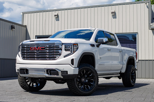 2025 GMC Sierra 1500 Denali with a 6" BDS lift kit, 22x12 Fuel Flame 35" Avix Trailtek R/T tires.