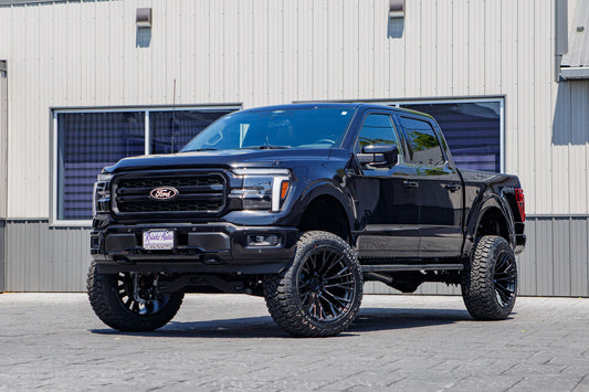 2025 Ford F-150 Lariat with a 6" Rough Country lift kit, 22x12 Fuel Rebar wheels, and 35" Fury Country Hunter R/T tires.