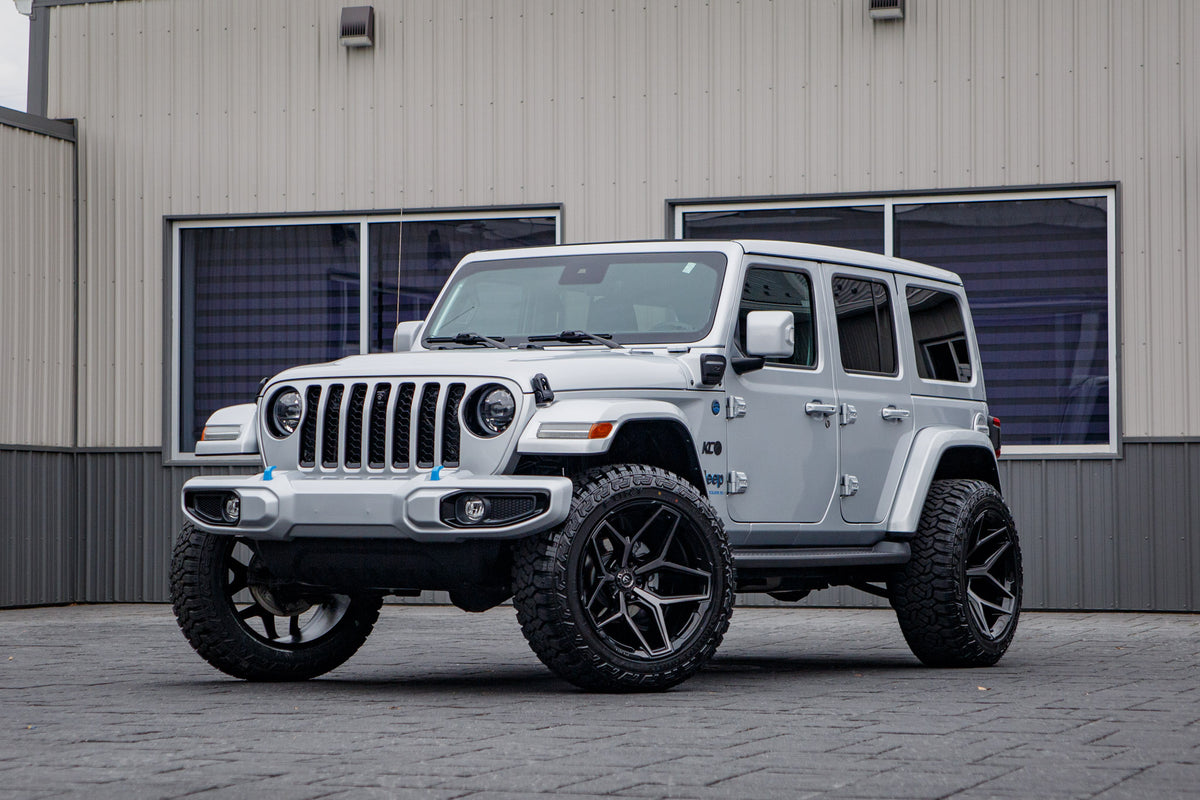 2023 Jeep Wrangler Sahara 4XE with a 2.5" Rough Country lift kit, 22x12 Fuel Flux wheels, and 35" Fury Country Hunter R/T tires.