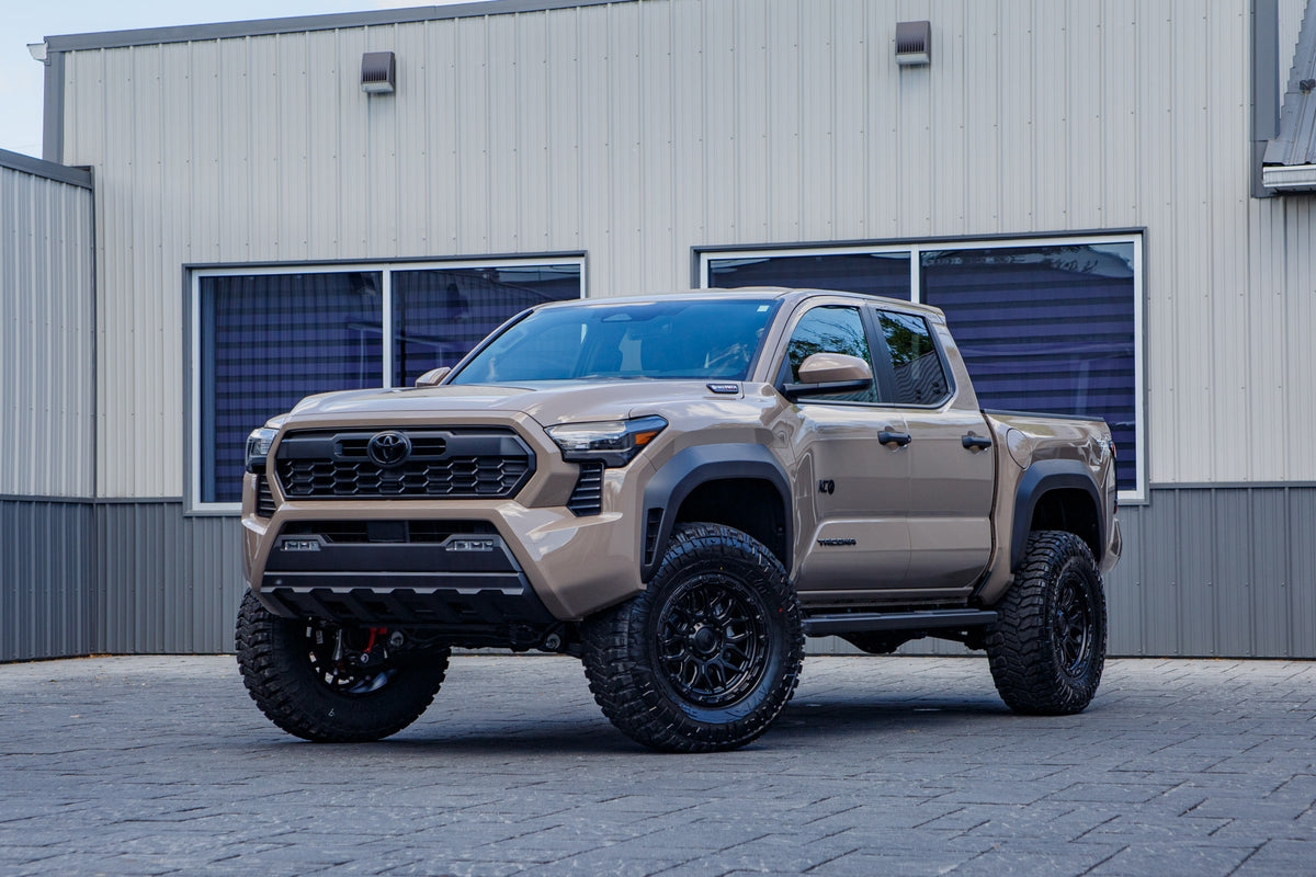 2026 Toyota Tacoma TRD Sport with a 3" ReadyLift lift kit, 18x9 Fuel Surge wheels, and 35" Avix Trailtek R/T tires.