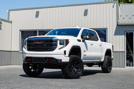 2024 GMC Sierra 1500 AT4 with a 6" Rough Country lift kit, 22x12 Fuel Catalyst, and 35" Avix Trailtek R/T tires.