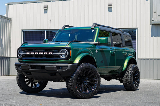 2022 Ford Bronco Outer Banks with a 3.5" Rough Country lift kit, 22x12 Fuel Flame wheels, and 35" Fury Rough Country R/T tires.