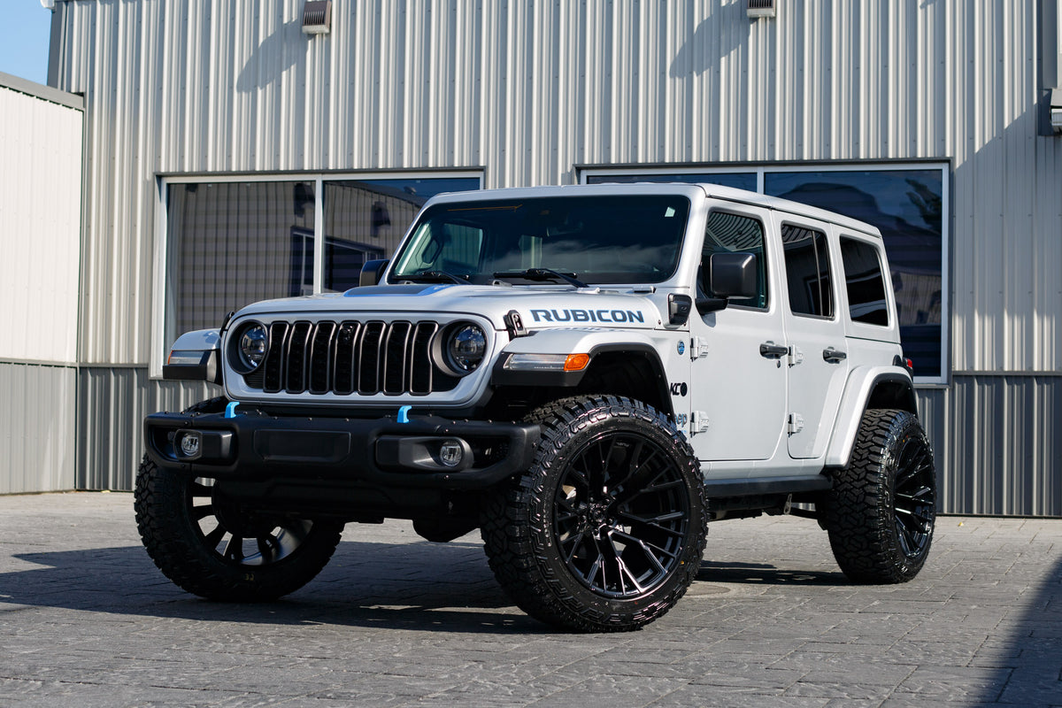 2024 Jeep Wrangler with Jeep Stock suspension, 22x12 Fuel Rebar wheels, and 35" Fury Country Hunter R/T tires.