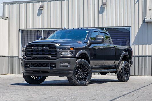 2026 Ram 2500 Warlock with a 2.5" Leveling kit, 22x10 Fuel Strike wheels, and 35" Fury Country Hunter R/T tires.
