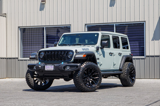 2024 Jeep Wrangler Willys 4XE with a 2.5" Rough Country lift kit, 22x12 Fuel Rebar wheels, and Fury Country Hunter R/T tires.