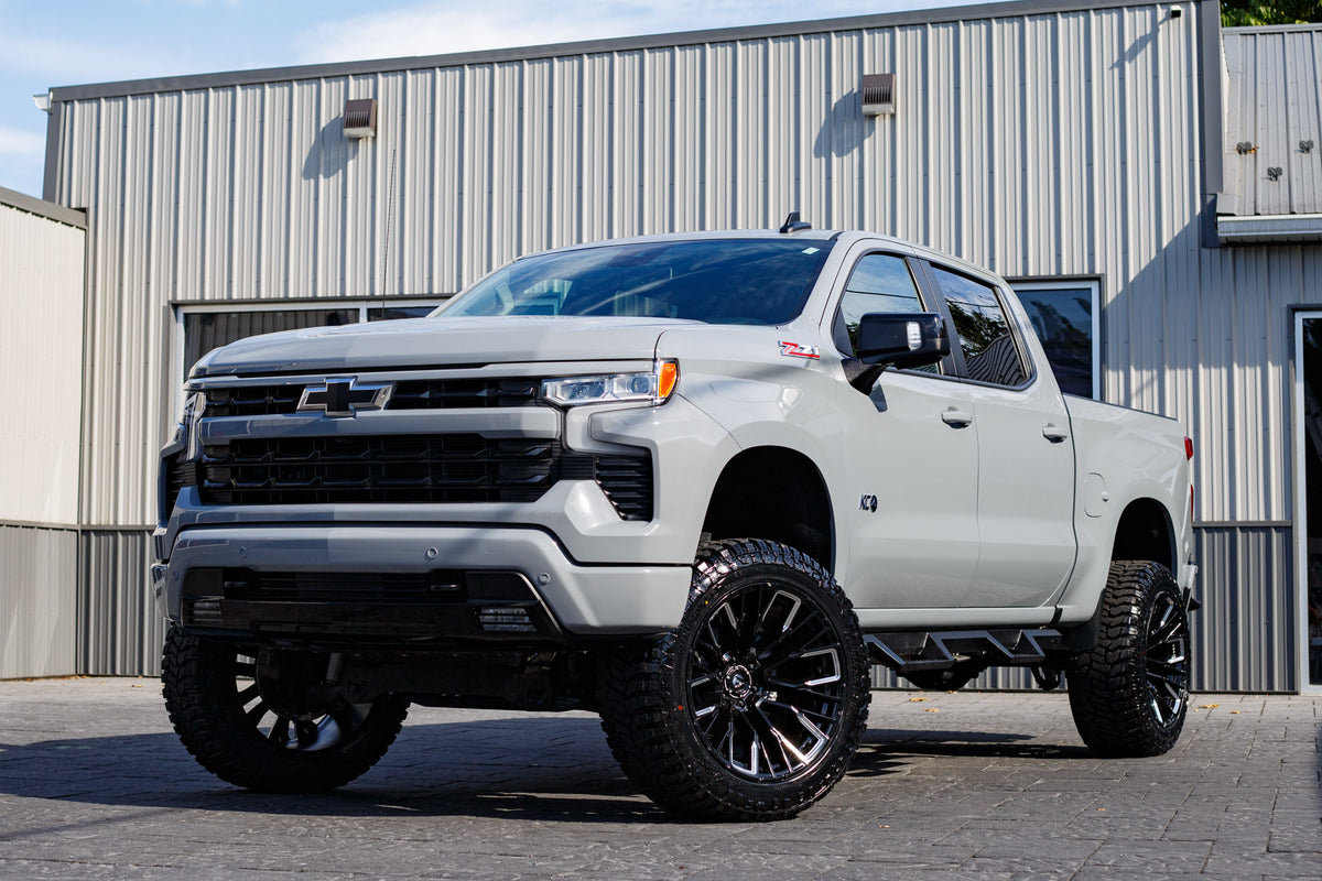 2024 Chevrolet Silverado 1500 RST with a 6" Rough Country lift kit, 22x12 Fuel Rebar wheels, and 35" Avix Trailtek R/T tires.