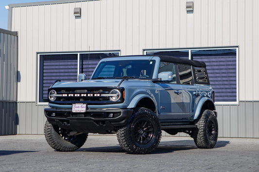 2023 Ford Bronco Outer Banks with a 3.5" Rough Country lift kit, 22x12 Fuel Clash wheels, and 35" Avix Trailtek R/T tires.