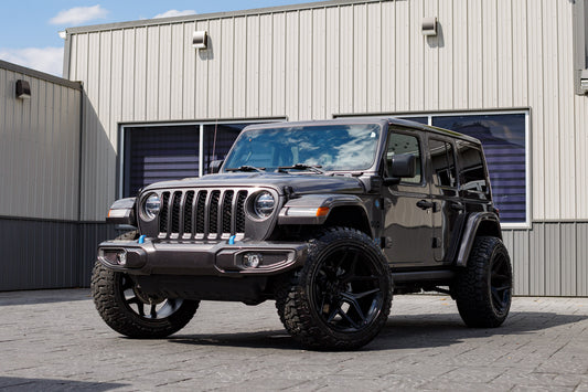 2022 Jeep Wrangler Unlimited Rubicon 4XE with Jeep Stock suspension, 22x12 Fuel Flux wheels, and 35" Country Hunter R/T tires,