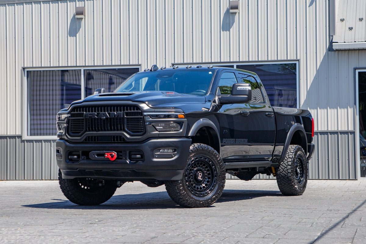 2025 Ram 2500 Power Wagon with a 2.5" Leveling Kit, 22x10 Black Rhino Sentinel wheels, and 35" Nitto Ridge Grappler Tires.