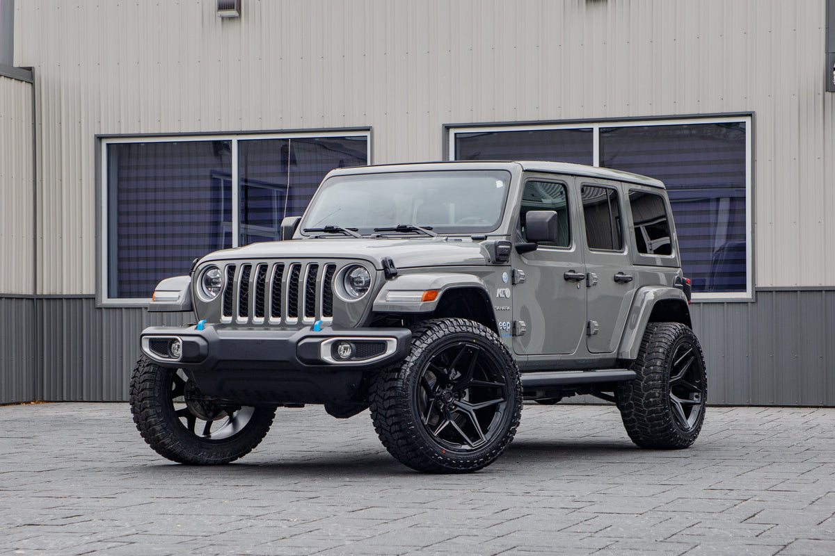 2023 Jeep Wrangler Sahara 4XE with a 2.5" Rough Country lift kit, 22x12 Fuel Flux wheels, and 35" Avix Trailtek R/T tires.