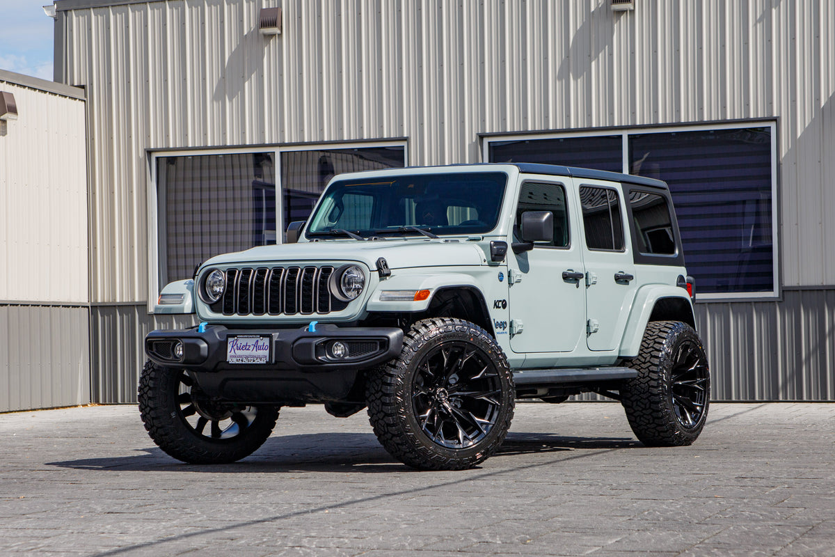 2024 Jeep Wrangler Willys 4XE with a 2.5" Rough Country lift kit, 22x12 Fuel Flame wheels, and 35" Fury Country Hunter R/T tires.