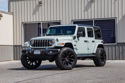 2024 Jeep Wrangler Willys 4XE with a 2.5" Rough Country lift kit, 22x12 Fuel Flame wheels, and 35" Fury Country Hunter R/T tires.