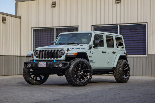 2024 Jeep Wrangler Rubicon 4XE with Jeep Stock suspension, 22x12 Fuel Flame wheels, and 35" Fury Country Hunter R/T tires.
