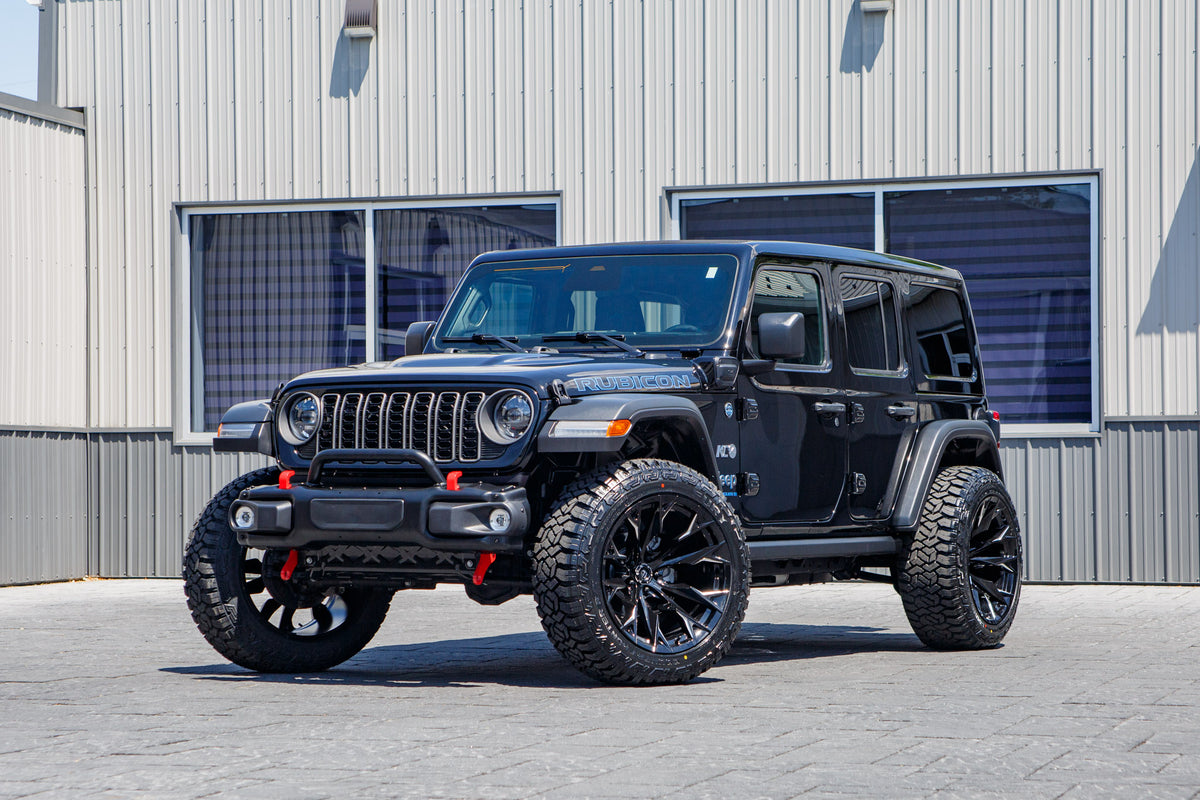 2025 Jeep Wrangler Rubicon 4XE with Jeep Stock suspension, 22x12 Fuel Flame wheels, and 35" Fury Country Hunter R/T tires.