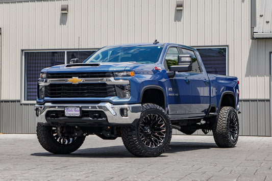 2026 Chevrolet Silverado 2500 LT with a 5" BDS lift kit, 22x12 Fuel Strike wheels, and 37" Nitto Ridge Grappler tires.
