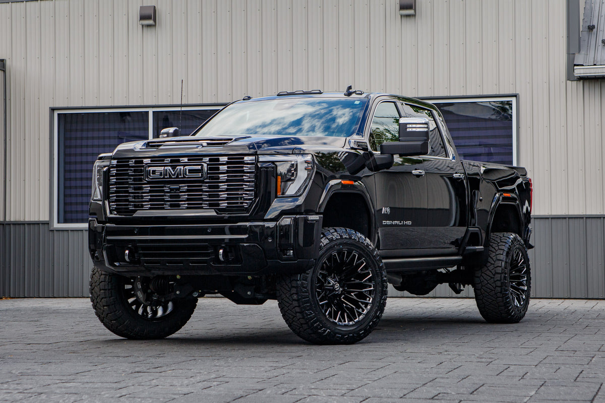 2025 GMC Sierra 2500 Denali Ultimate with a 5" BDS lift kit, 22x12 Fuel Strike wheels, and 37" Nitto Ridge Grappler tires.