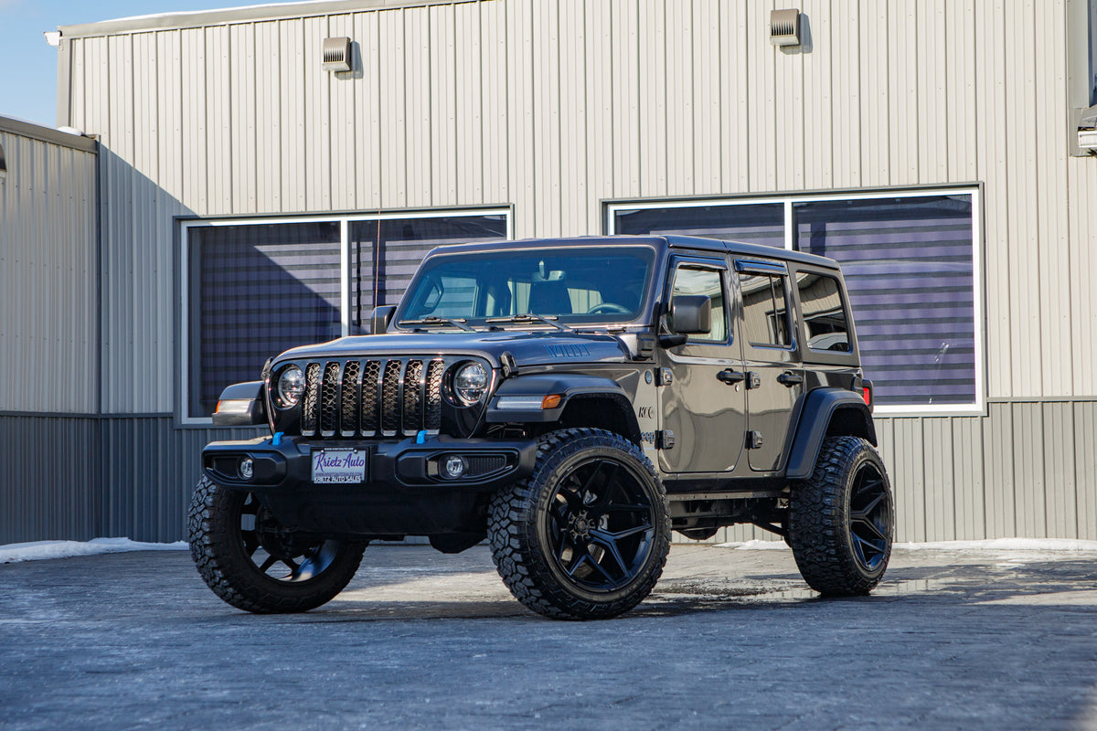 2023 Jeep Wrangler Willys 4XE with a 2.5" Rough Country lift kit, 22x12 Fuel Flux wheels, and 35" Fury Country Hunter R/T tires.
