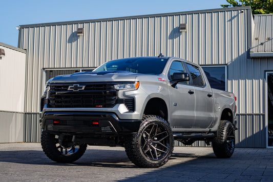 2025 Chevrolet Silverado 1500 LT Trail Boss with a 6" Rough Country lift kit, 22x12 Fuel Flux wheels, and 35" Avix Trailtek tires.