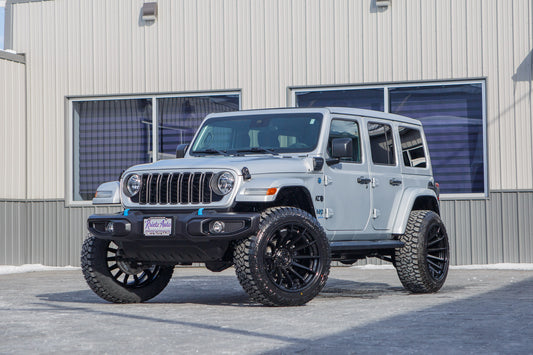 2024 Jeep Wrangler Sport S 4XE with a 2.5" Rough Country lift kit, 22x12 Fuel Burn wheels, and 35" Fury Country Hunter R/T tires.