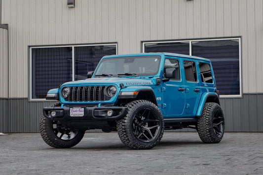 2024 Jeep Wrangler Rubicon 4XE with Jeep Stock suspension, 22x12 Fuel Flux wheels, and 35" Fury Country Hunter R/T tires.