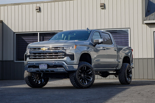 2025 Chevrolet Silverado 1500 LTZ with a 6" Rough Country lift kit, 22x12 Fuel Rebar wheels, and 35" Fury Country Hunter R/T tires.