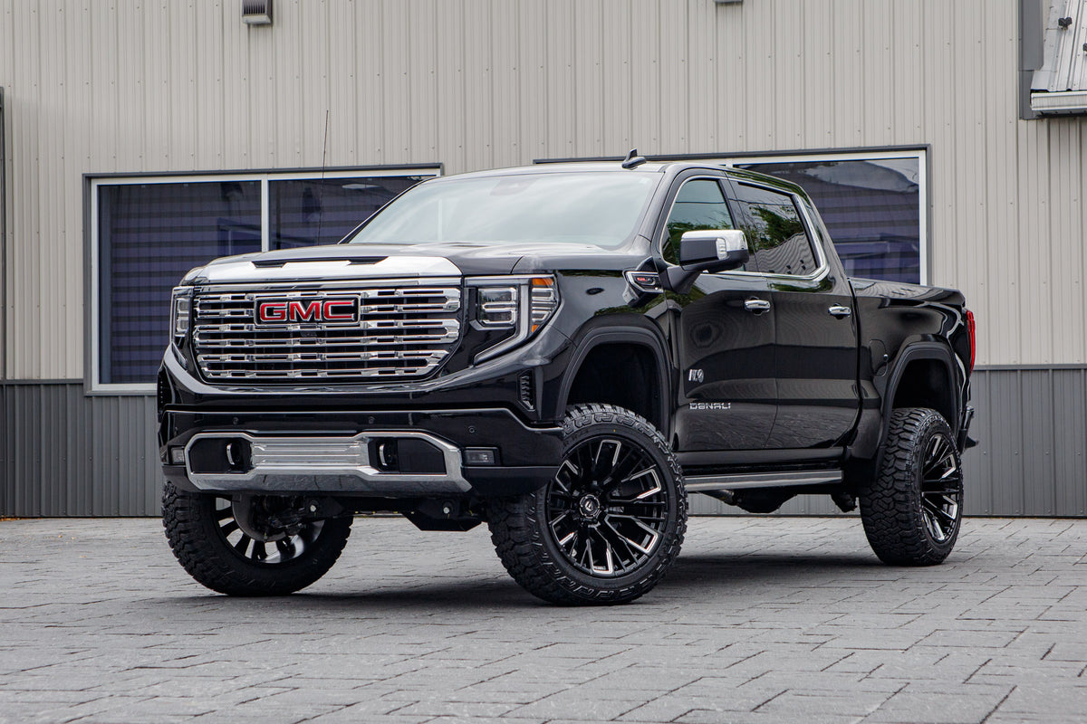 2026 GMC Sierra 1500 Denali with a 6" BDS lift kit, 22x12 Fuel Rebar wheels, and 35" Fury Country Hunter R/T tires.