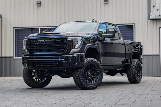 2026 GMC Sierra 2500 AT4 with a 5" BDS lift kit, 22x12 Vossen HFX1 wheels, and 37" Nitto Ridge Grappler tires.