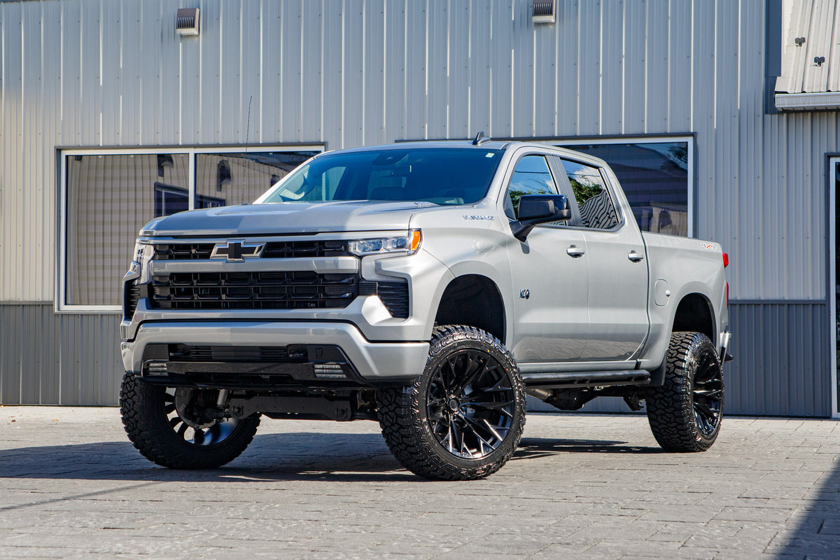 2026 Chevrolet Silverado 1500 RST with a 6" Rough Country lift kit, 22x12 Fuel Flame wheels, and 35" Fury Country Hunter R/T tires.