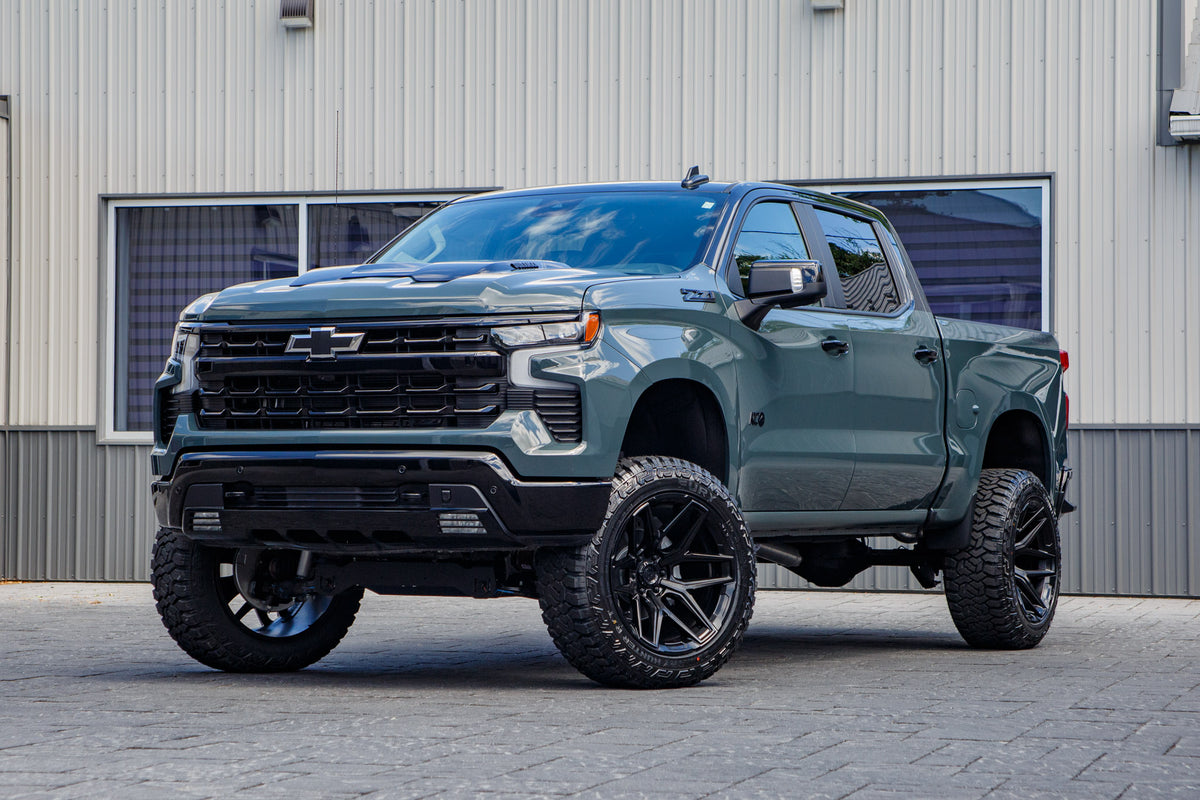 2026 Chevrolet Silverado 1500 LT Trail Boss with a 6" Rough Country lift kit, 22x12 Fuel Flux wheels, and 35" Fury Country Hunter R/T tires.