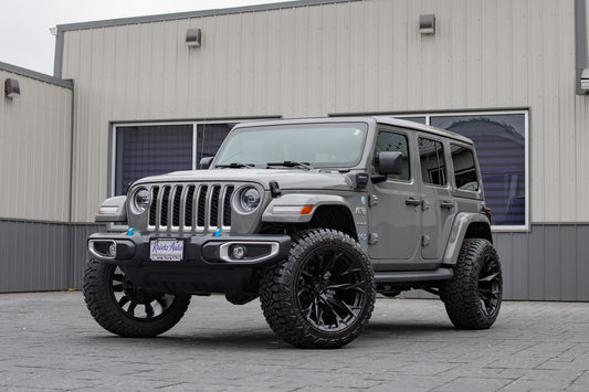 2023 Jeep Wrangler Sahara 4XE with a 2.5" Rough Country lift kit, 22x12 Fuel Flame wheels, and 35" Fury Country Hunter R/T tires.